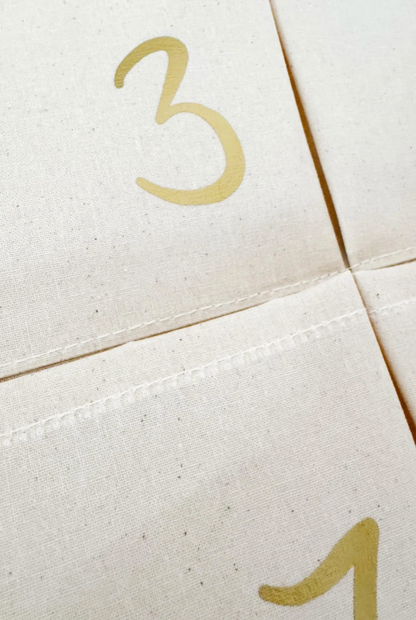 nachhaltiger Adventskalender mit Zahlen in Wunschfarbe – handmade